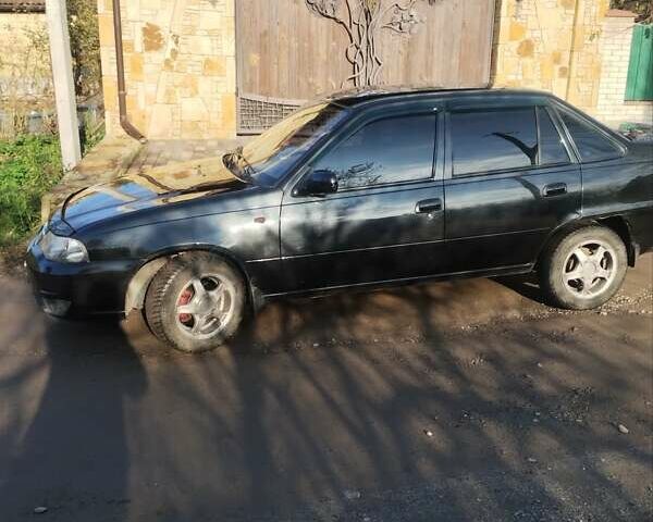 Чорний Деу Нексія, об'ємом двигуна 1.5 л та пробігом 103 тис. км за 2450 $, фото 3 на Automoto.ua