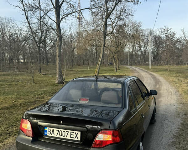 Чорний Деу Нексія, об'ємом двигуна 1.5 л та пробігом 141 тис. км за 2500 $, фото 2 на Automoto.ua