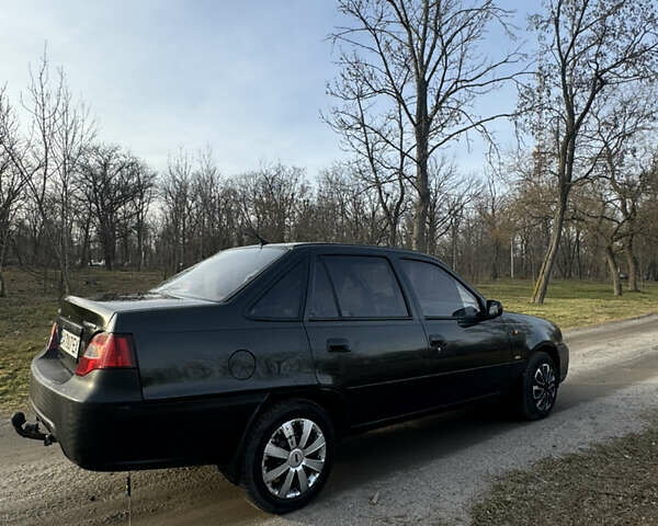 Чорний Деу Нексія, об'ємом двигуна 1.5 л та пробігом 141 тис. км за 2500 $, фото 6 на Automoto.ua