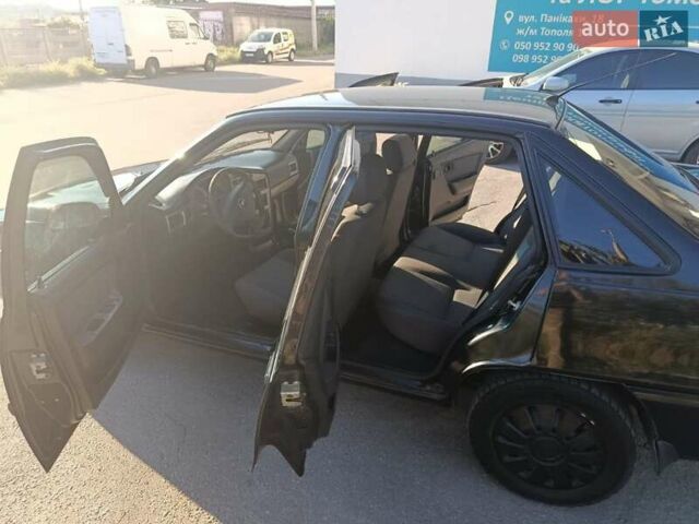 Черный Дэу Нексия, объемом двигателя 1.6 л и пробегом 122 тыс. км за 2400 $, фото 6 на Automoto.ua