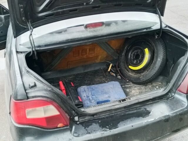 Чорний Деу Нексія, об'ємом двигуна 1.5 л та пробігом 334 тис. км за 1400 $, фото 10 на Automoto.ua