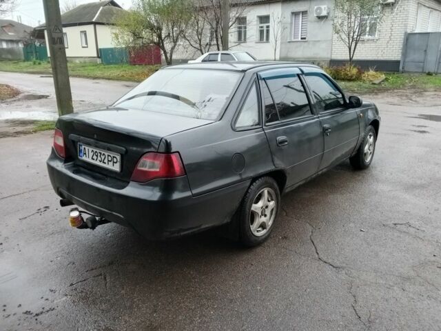 Чорний Деу Нексія, об'ємом двигуна 1.5 л та пробігом 334 тис. км за 1400 $, фото 3 на Automoto.ua