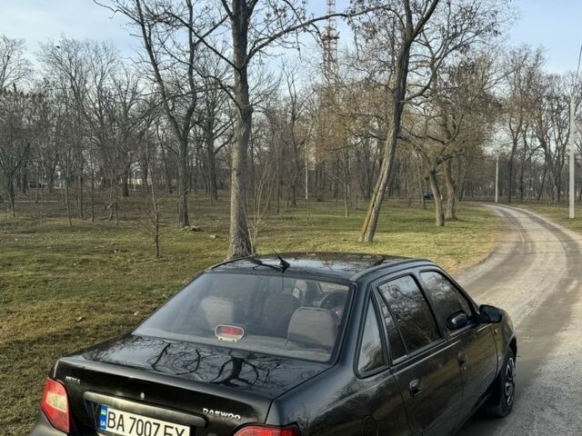Чорний Деу Нексія, об'ємом двигуна 1.5 л та пробігом 141 тис. км за 2500 $, фото 4 на Automoto.ua