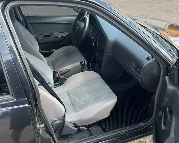 Чорний Деу Нексія, об'ємом двигуна 1.5 л та пробігом 265 тис. км за 2600 $, фото 11 на Automoto.ua