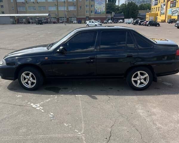 Чорний Деу Нексія, об'ємом двигуна 1.5 л та пробігом 265 тис. км за 2600 $, фото 5 на Automoto.ua