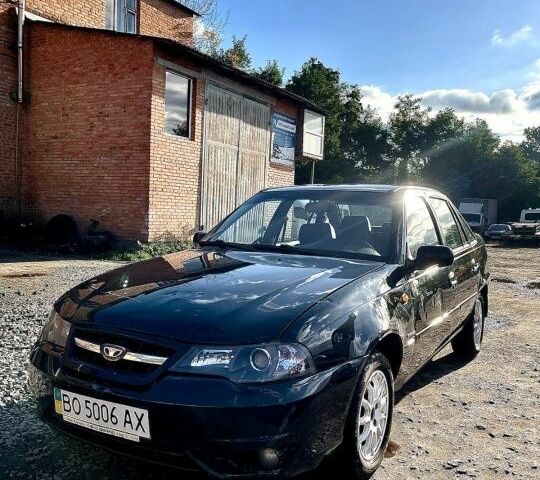 Деу Нексія 2011 у Вінниці на Automoto.ua Чорний Деу Нексія, об'ємом двигуна 1.6 л та пробігом 95 тис. км за 2200 $, фото 5 на Automoto.ua