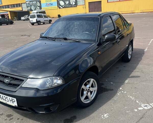 Чорний Деу Нексія, об'ємом двигуна 1.5 л та пробігом 265 тис. км за 2600 $, фото 6 на Automoto.ua