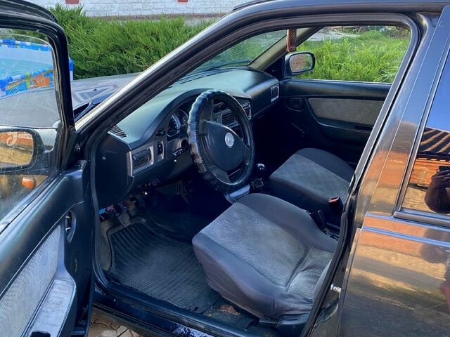 Чорний Деу Нексія, об'ємом двигуна 1.5 л та пробігом 400 тис. км за 870 $, фото 3 на Automoto.ua