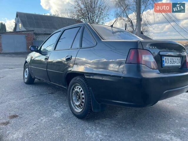 Деу Нексія 2011 у Змиеве на Automoto.ua Чорний Деу Нексія, об'ємом двигуна 1.5 л та пробігом 248 тис. км за 1100 $, фото 1 на Automoto.ua