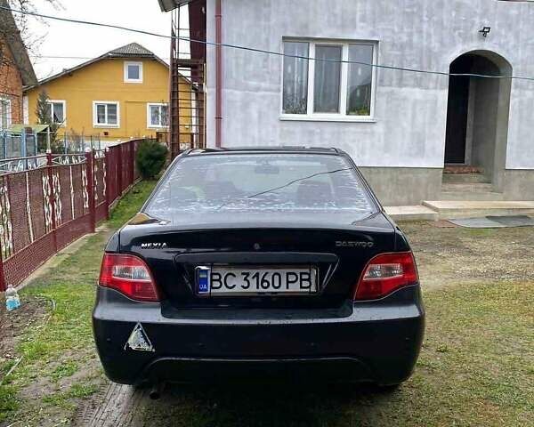 Черный Дэу Нексия, объемом двигателя 1.5 л и пробегом 252 тыс. км за 2300 $, фото 2 на Automoto.ua