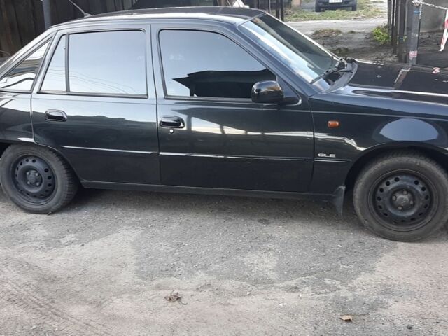 Чорний Деу Нексія, об'ємом двигуна 1.5 л та пробігом 98 тис. км за 4000 $, фото 6 на Automoto.ua
