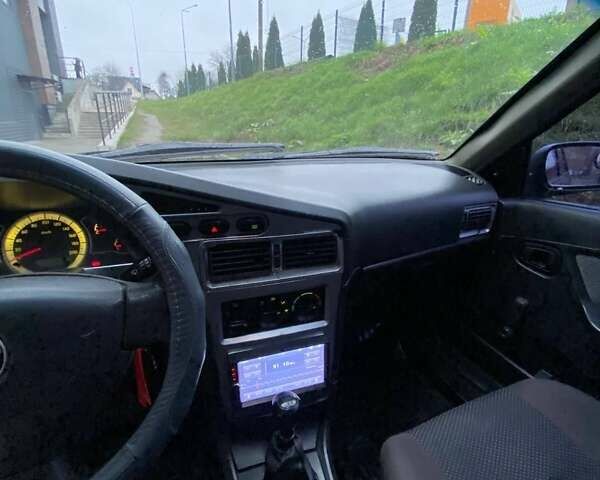 Черный Дэу Нексия, объемом двигателя 1.5 л и пробегом 184 тыс. км за 2350 $, фото 27 на Automoto.ua