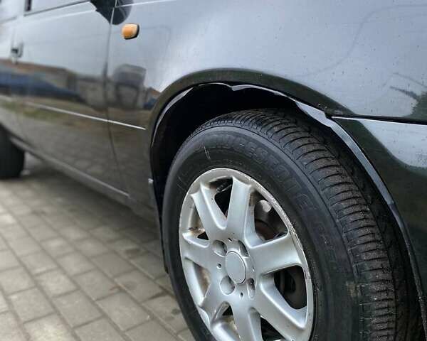 Черный Дэу Нексия, объемом двигателя 1.5 л и пробегом 184 тыс. км за 2350 $, фото 20 на Automoto.ua