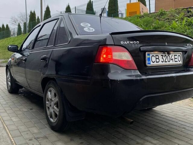 Черный Дэу Нексия, объемом двигателя 1.5 л и пробегом 184 тыс. км за 2350 $, фото 2 на Automoto.ua