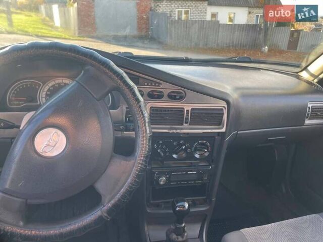 Деу Нексія 2011 у Змиеве на Automoto.ua Чорний Деу Нексія, об'ємом двигуна 1.5 л та пробігом 248 тис. км за 1100 $, фото 8 на Automoto.ua