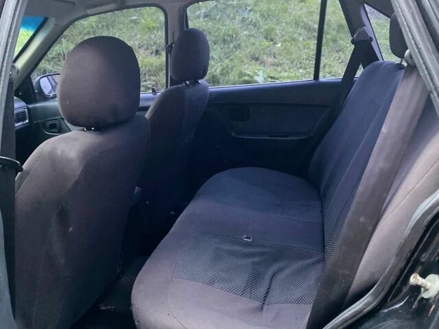 Черный Дэу Нексия, объемом двигателя 1.5 л и пробегом 184 тыс. км за 2350 $, фото 5 на Automoto.ua