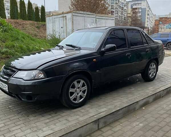 Черный Дэу Нексия, объемом двигателя 1.5 л и пробегом 184 тыс. км за 2350 $, фото 3 на Automoto.ua