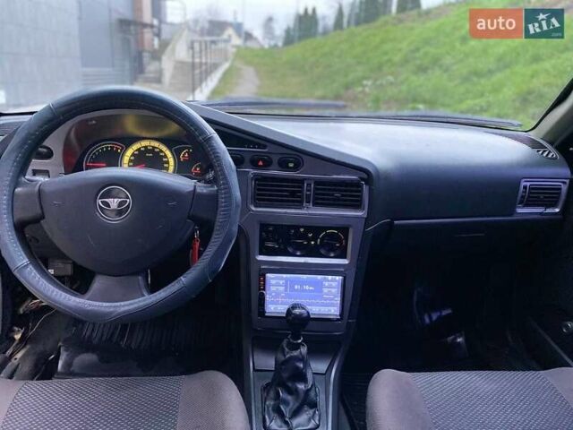 Черный Дэу Нексия, объемом двигателя 1.5 л и пробегом 184 тыс. км за 2350 $, фото 26 на Automoto.ua