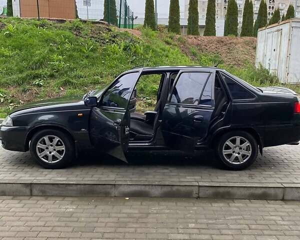 Черный Дэу Нексия, объемом двигателя 1.5 л и пробегом 184 тыс. км за 2350 $, фото 7 на Automoto.ua