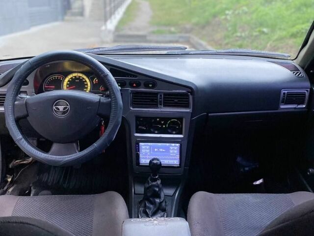 Черный Дэу Нексия, объемом двигателя 1.5 л и пробегом 184 тыс. км за 2350 $, фото 4 на Automoto.ua