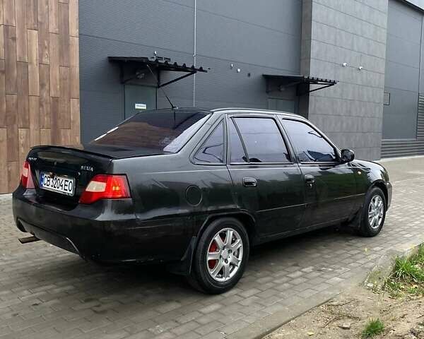 Черный Дэу Нексия, объемом двигателя 1.5 л и пробегом 184 тыс. км за 2350 $, фото 11 на Automoto.ua