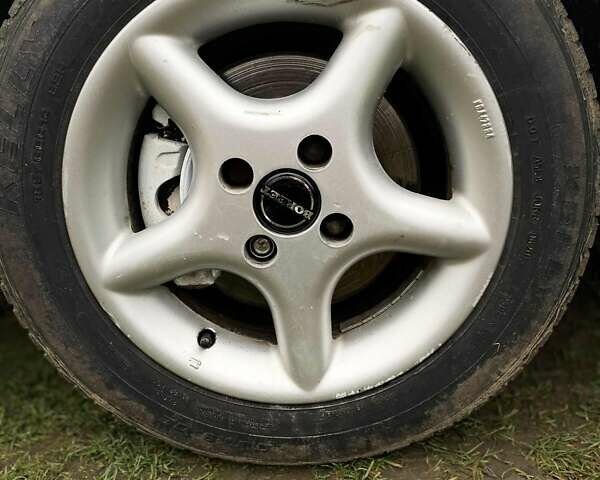 Черный Дэу Нексия, объемом двигателя 1.5 л и пробегом 252 тыс. км за 2300 $, фото 11 на Automoto.ua