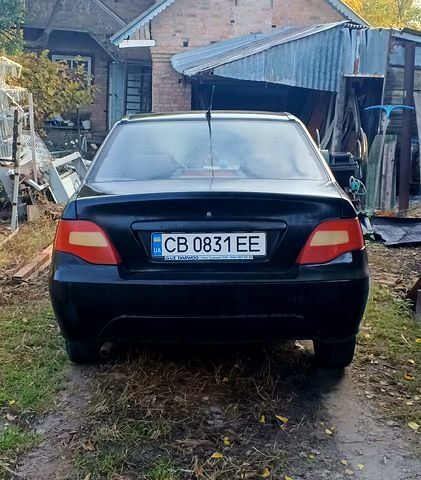 Черный Дэу Нексия, объемом двигателя 1.5 л и пробегом 218 тыс. км за 1300 $, фото 1 на Automoto.ua