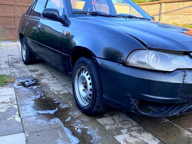 Чорний Деу Нексія, об'ємом двигуна 1.5 л та пробігом 400 тис. км за 870 $, фото 2 на Automoto.ua