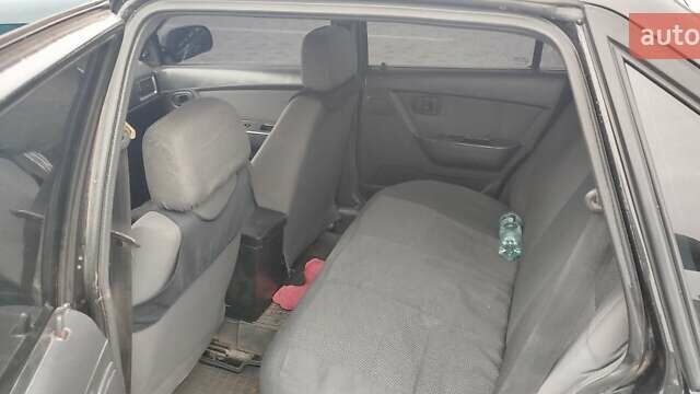 Чорний Деу Нексія, об'ємом двигуна 1.5 л та пробігом 160 тис. км за 3300 $, фото 9 на Automoto.ua