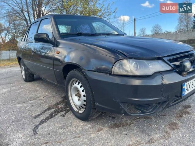 Деу Нексія 2011 у Змиеве на Automoto.ua Чорний Деу Нексія, об'ємом двигуна 1.5 л та пробігом 248 тис. км за 1100 $, фото 3 на Automoto.ua