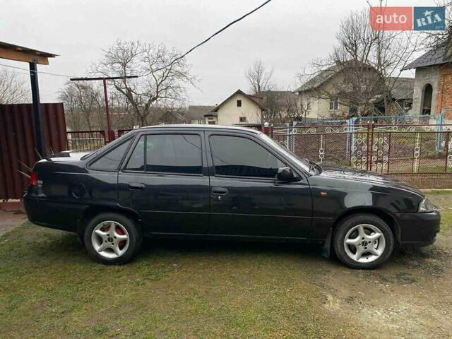 Черный Дэу Нексия, объемом двигателя 1.5 л и пробегом 252 тыс. км за 2300 $, фото 1 на Automoto.ua