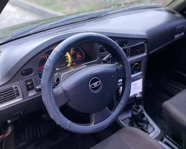 Черный Дэу Нексия, объемом двигателя 1.5 л и пробегом 184 тыс. км за 2350 $, фото 25 на Automoto.ua