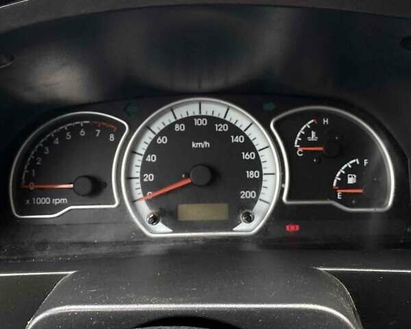 Черный Дэу Нексия, объемом двигателя 1.5 л и пробегом 252 тыс. км за 2300 $, фото 4 на Automoto.ua