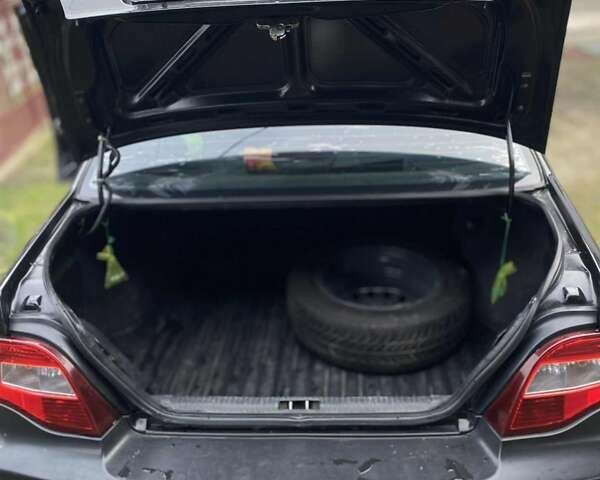 Черный Дэу Нексия, объемом двигателя 1.5 л и пробегом 252 тыс. км за 2300 $, фото 13 на Automoto.ua