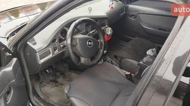 Чорний Деу Нексія, об'ємом двигуна 1.5 л та пробігом 160 тис. км за 3300 $, фото 8 на Automoto.ua