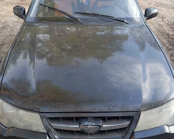 Чорний Деу Нексія, об'ємом двигуна 1.5 л та пробігом 240 тис. км за 950 $, фото 1 на Automoto.ua