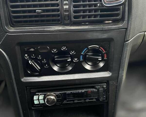 Черный Дэу Нексия, объемом двигателя 1.5 л и пробегом 252 тыс. км за 2300 $, фото 5 на Automoto.ua