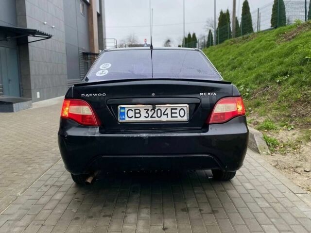 Черный Дэу Нексия, объемом двигателя 1.5 л и пробегом 184 тыс. км за 2350 $, фото 3 на Automoto.ua