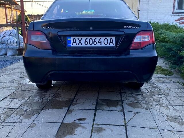 Чорний Деу Нексія, об'ємом двигуна 1.5 л та пробігом 400 тис. км за 870 $, фото 1 на Automoto.ua