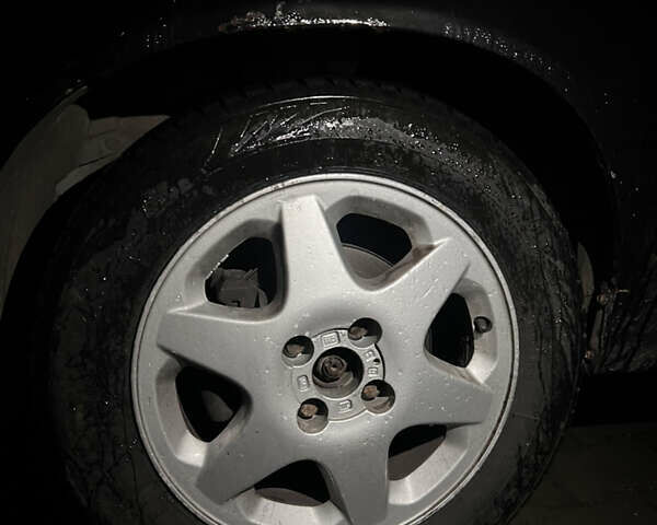 Чорний Деу Нексія, об'ємом двигуна 1.6 л та пробігом 201 тис. км за 1799 $, фото 14 на Automoto.ua