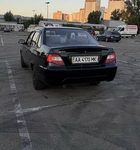 Черный Дэу Нексия, объемом двигателя 1.5 л и пробегом 147 тыс. км за 2500 $, фото 4 на Automoto.ua