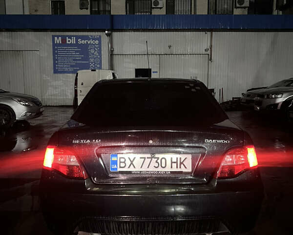 Чорний Деу Нексія, об'ємом двигуна 1.6 л та пробігом 201 тис. км за 1799 $, фото 3 на Automoto.ua
