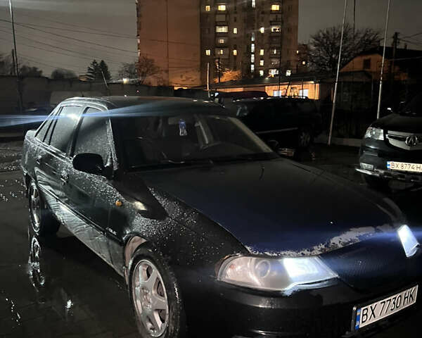 Чорний Деу Нексія, об'ємом двигуна 1.6 л та пробігом 201 тис. км за 1799 $, фото 4 на Automoto.ua