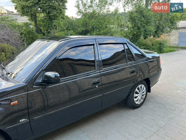 Черный Дэу Нексия, объемом двигателя 1.5 л и пробегом 138 тыс. км за 2650 $, фото 11 на Automoto.ua