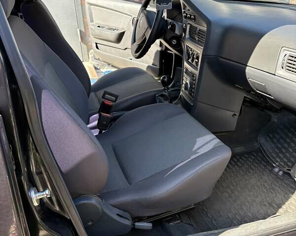 Черный Дэу Нексия, объемом двигателя 1.6 л и пробегом 92 тыс. км за 3700 $, фото 13 на Automoto.ua