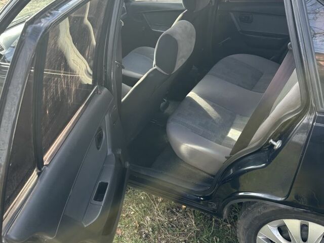 Чорний Деу Нексія, об'ємом двигуна 1.5 л та пробігом 231 тис. км за 1500 $, фото 6 на Automoto.ua