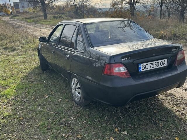 Чорний Деу Нексія, об'ємом двигуна 1.5 л та пробігом 231 тис. км за 1500 $, фото 3 на Automoto.ua
