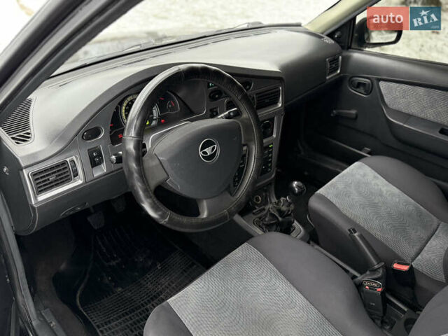 Черный Дэу Нексия, объемом двигателя 1.6 л и пробегом 128 тыс. км за 2850 $, фото 13 на Automoto.ua