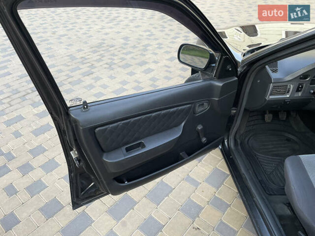 Чорний Деу Нексія, об'ємом двигуна 1.5 л та пробігом 135 тис. км за 2750 $, фото 14 на Automoto.ua