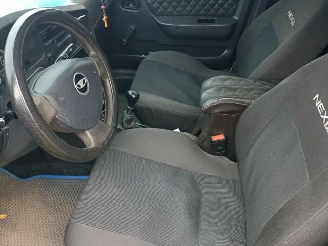 Чорний Деу Нексія, об'ємом двигуна 1.5 л та пробігом 212 тис. км за 2500 $, фото 6 на Automoto.ua